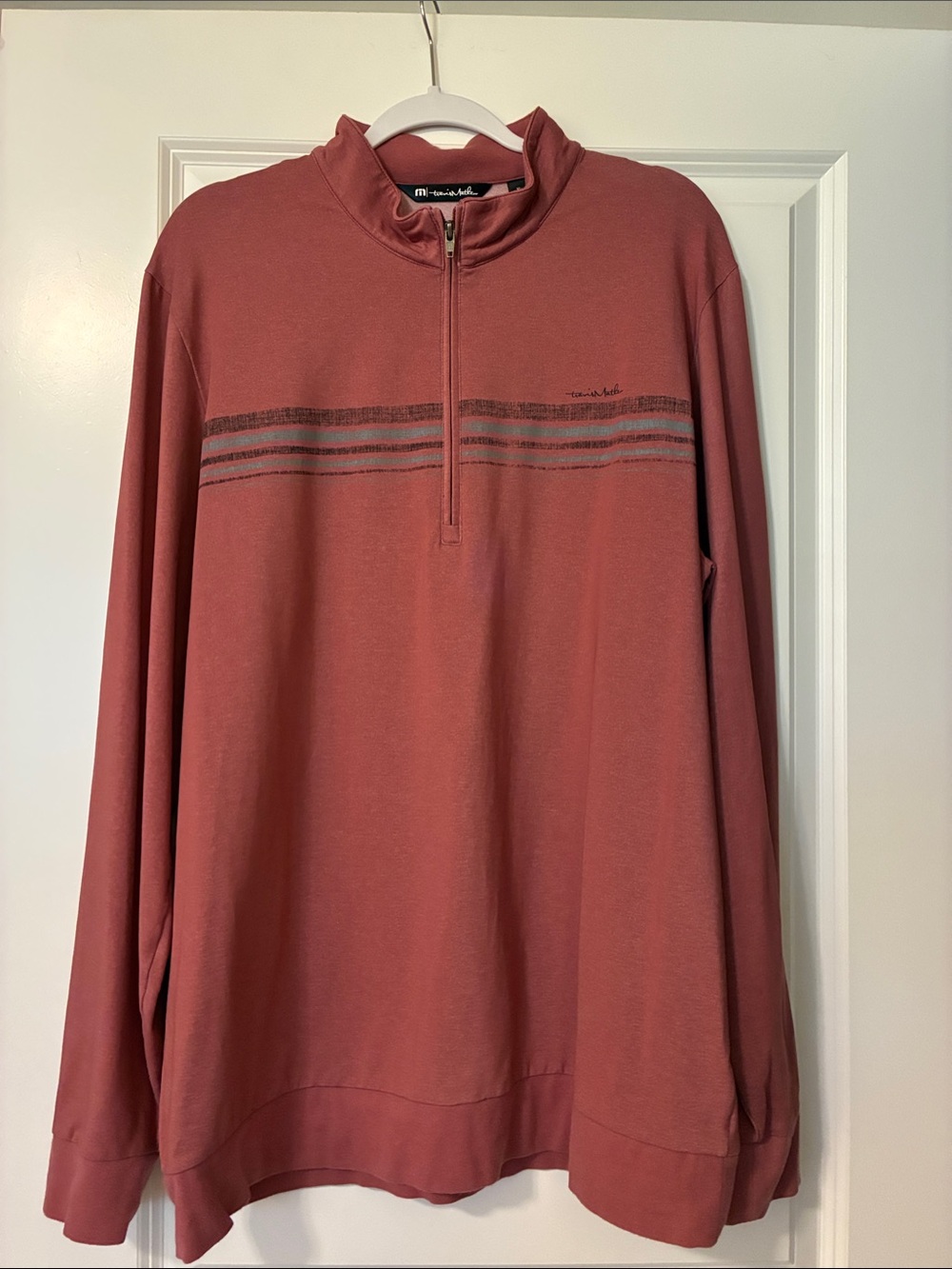Travis Mathew Men's Half-Zip burgundy Pullover.